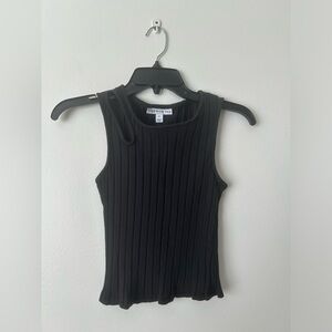 And Now This medium top